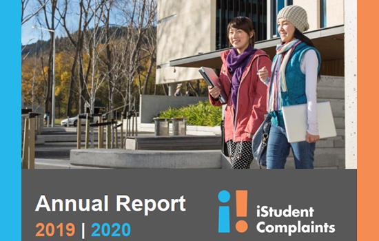 Annual Report Title, two international students in front of University
